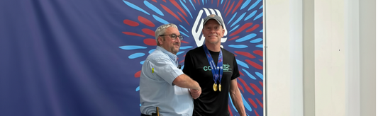 Colin receiving his medal on the 1st place podium at the British Masters Championships in Aberdeen